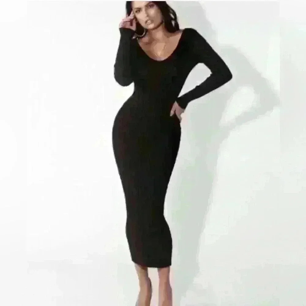 Never worn black ribbed body con knitted dress